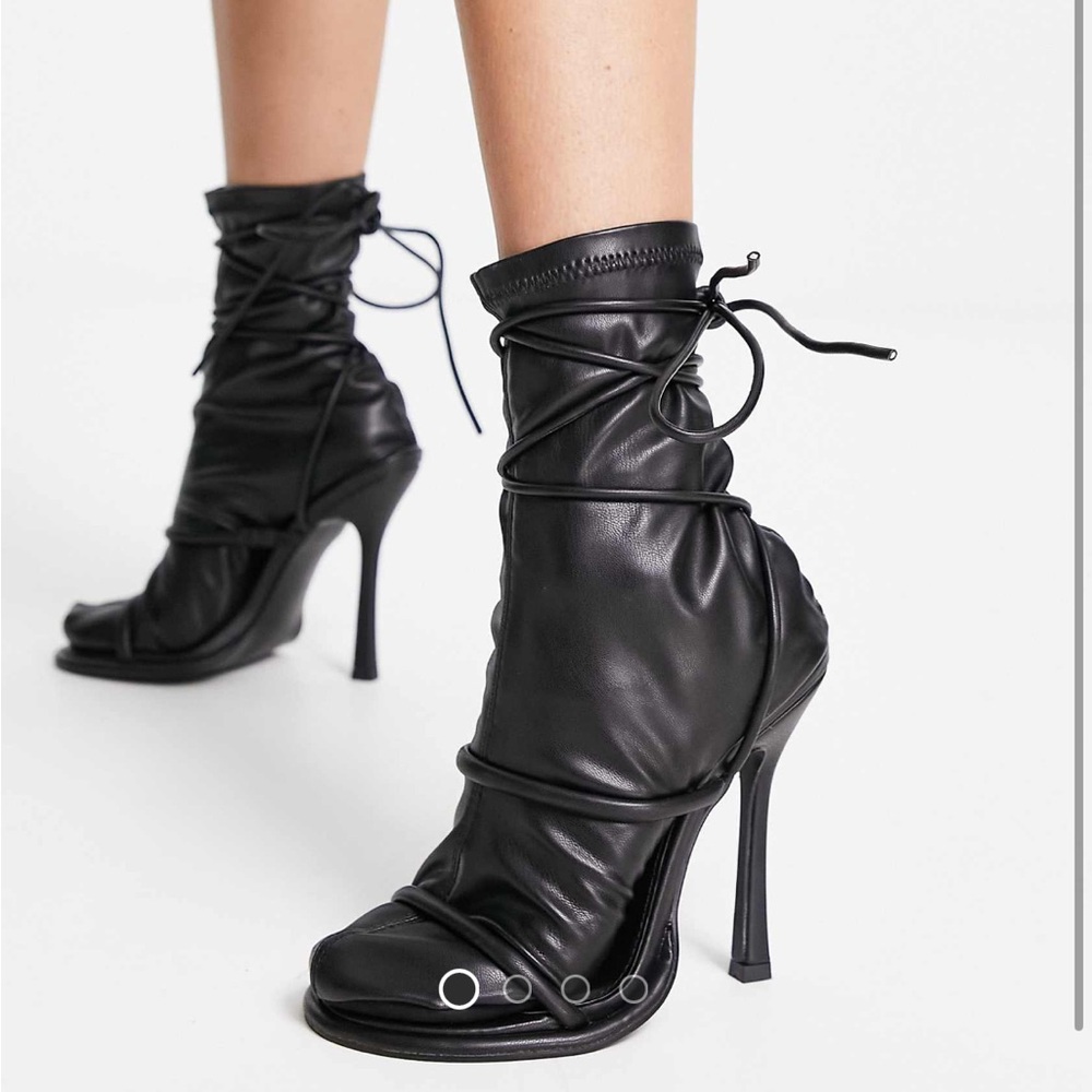 Public Desire Herring strap detail sock boots in black
